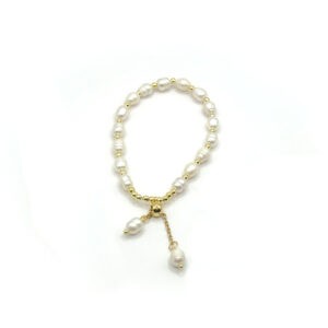La perla. Elegant pearl and gold stainless steel bracelet with elastic fit and delicate dangling pearl details. Ατσάλινο δαχτυλίδι, stainless steel bracelet, steinless steel jewelry