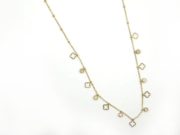 Gold stainless steel necklace with decorative elements and sparkling zircon stones. An elegant and timeless design for any occasion.